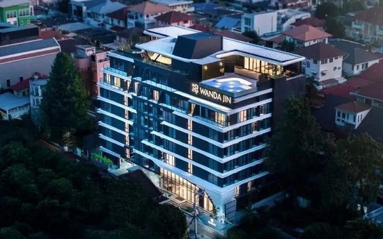 配资专业门户登录入口 万达酒店发展抛售核心资产，24亿港元或派息“入袋”王健林父子